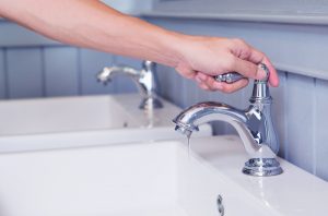 hand-opening-faucet-tap