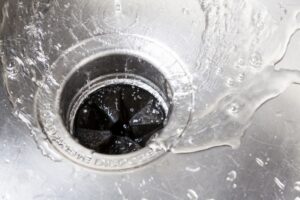 water-going-down-garbage-disposal