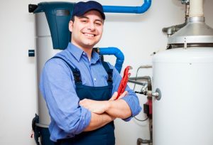 smiling-plumber-with-wrench-and-water-heater