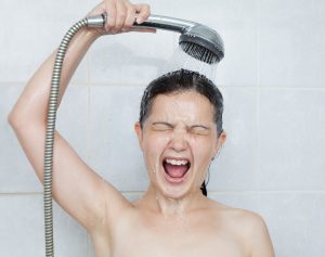 distressed-person-in-cold-shower